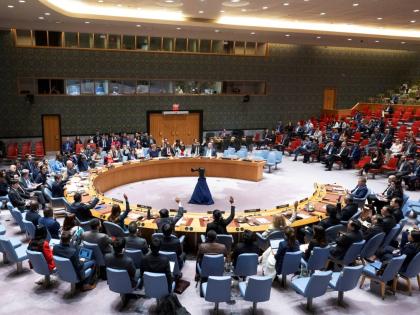 In this photo provided by the United Nations, members of the UN Security Council vote to approve its first resolution endorsing a cease-fire plan aimed at ending the eight-month war between Israel and Hamas in Gaza, Monday, June 10, 2024. 