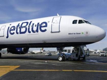 A JetBlue airplane is seen, March 16, 2017, at John F Kennedy International Airport in New York.