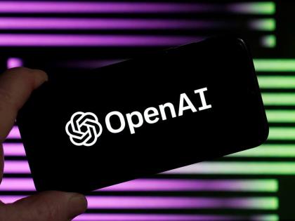 The logo for OpenAI, the maker of ChatGPT, appears on a mobile phone, in New York