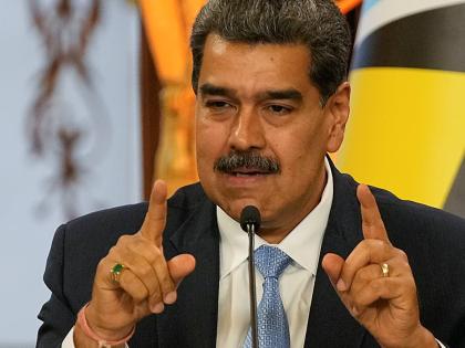 Venezuelan President Nicolás Maduro speaks during a meeting with St Lucia's Prime Minister Philip Joseph Pierre at the Miraflores presidential palace in Caracas, Venezuela, Friday, October 6, 2023. (AP Photo/Matias Delacroix)