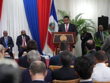 Presidential Council Chair Laurent Saint-Cyr speaks during a ceremony marking the end of the transitional council's almost two-year rule, in Port-au-Prince, Saturday, February 7, 2026. (AP Photo/Odelyn Joseph)