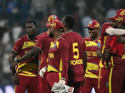 West Indies players celebrate a win over England in their second Group C ICC T20 World Cup cricket game at the Wankhede Stadium in Mumbai, India, last month.