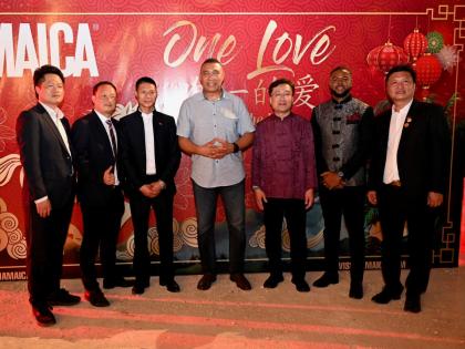 Members of the Chinese community out of western Jamaica with Prime Minister Dr Andrew Holness (centre) and Mayor of Montego Bay Richard Vernon (second right) during the Chinese New Year event in Montego Bay on Sunday.