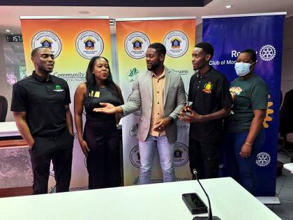 Richard Vernon (centre), mayor of Montego Bay, interacts with local and international partners of his Mayor’s Charity Fund Adopt-a-House Programme during its launch at the St James Municipal Corporation chamber. From left are Deon Richardson, CEO of Comm