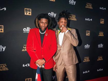 Popular dancehall artiste Ayetian (left) with Producer Nvtzz make their entrance on the red carpet at the 2025 Caribbean Music Awards.
