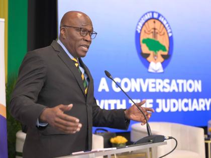 Chief Justice, Bryan Sykes, addresses a recent forum, dubbed 'A Conversation with the Judiciary' held at the Summit in St Andrew.

