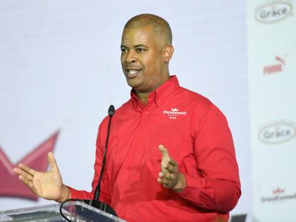 GraceKennedy CEO Frank James speaks during the lSSA/GraceKennedy Boys and Girls’ Athletics Championships launch at the National Arena yesterday.