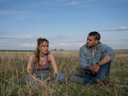 This image released by Universal Pictures shows Maika Monroe, and Tyriq Withers in a scene from ‘Reminders of Him’.