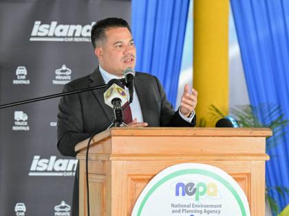 Minister of Water, Environment and Climate Change,  Matthew Samuda, delivering the keynote address during a recent National Schools Environmental Clubs Student Workshop, hosted by the National Environment and Planning Agency (NEPA) at Titchfield High Schoo