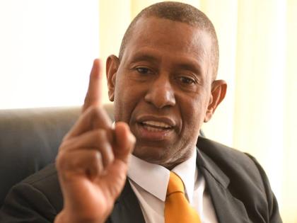 Hugh Wildman, attorney for Fritz Pinnock and Ruel Reid. 