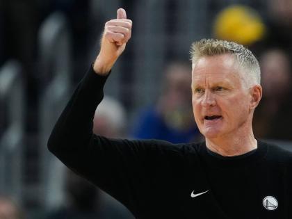 Golden State Warriors head coach Steve Kerr gestures during the first half of an NBA basketball game against the Minnesota Timberwolves on Friday, March 13 in San Francisco. 