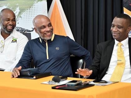 From left: Calbert Hutchinson, president of Jamaica Lacrosse; Christopher Samuda, president of the Jamaica Olympic Association, and Dr Asburn Pinnock, president of Mico University College speak at press conference at the Mico University College in Kingston