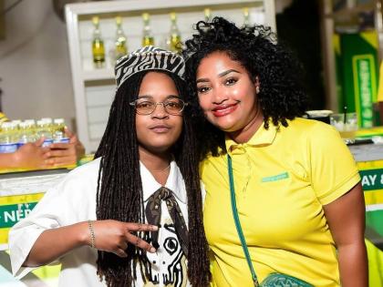 Reggae star Koffee (left) and Kerry Ann Bryan, Wray Rum brand manager, pause their confab for a quick photo.