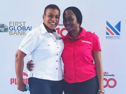 ISSA Vice-President and Principal of Wolmer’s Trust High School for Girls Colleen Montague (left) and Kimberly Smalling, senior account executive at Main Event.