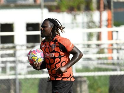 Tivoli’s Rodico Wellington runs to the centre circle after scoring the equaliser against Harbour View at the Edward Seaga Sports Complex yesterday. 