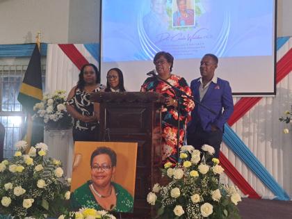 Dr Michelle Pinnock (second from right), daughter of the late Dr Cecile Walden, presents remarks on behalf of her family during a remembrance and honour service on Wednesday at Sam Sharpe Teachers’ College in Montego Bay, St James. Also pictured are Wald