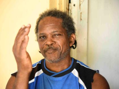 Neville Clarke said the accomplishment of owning a home has been dampened by the fact that he has, for years, been living without basic social amenities. 