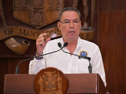 Minister of Transport, Daryl Vaz, addressing a post-Cabinet press briefing at Jamaica House on April 9.