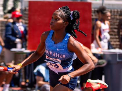 An Edwin Allen athlete competes in the Championship of America 4x100 metres at the Penn Relays inside the Franklin Field stadium in Philadelphia last week.