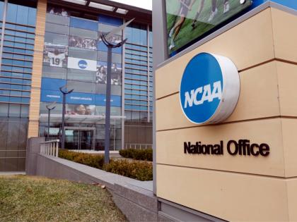 FILE - This March 12, 2020, file photo, shows the national office of the NCAA in Indianapolis. (AP Photo/Michael Conroy, File)