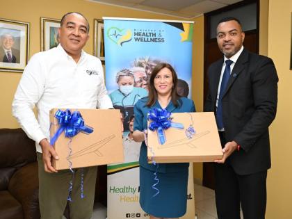 Minister of Health and Wellness, Dr Christopher Tufton (left) is joined by Caribbean Ecosystem Lead, Roche Servicios Caribbean, Central America and Venezuela (CCAV), Marianela Gonzales (centre) and Healthcare Ecosystem Partner, Caribbean – Roche Servicio