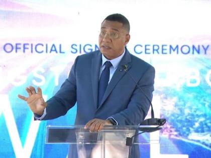 Prime Minister Dr Andrew Holness speaking at the signing of the contract for the Kingston Harbour Walk Project on July 22, 2026. 