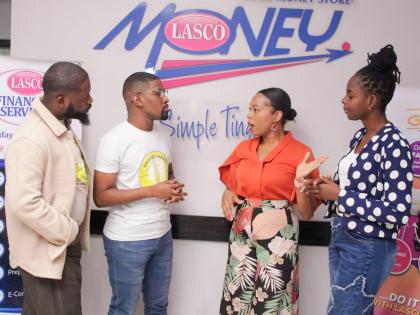 Donrick Dixon (left), director of people and culture at the Greater Change Foundation; Warren Bernard, board chairman of the Foundation; Samantha Fuller-Maragh (second right), brand manager – card services at LASCO Financial Services; and Celine Barton, 