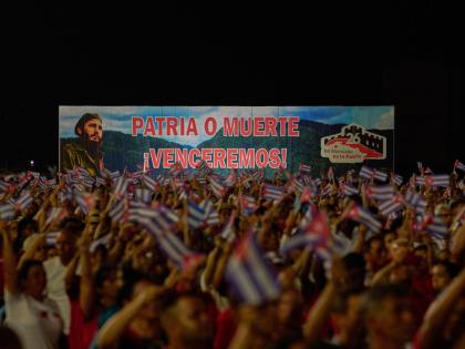 A billboard depicting the late leader Fidel Castro and reading “Homeland or death, we will defeat!” is seen during an event marking the 73th anniversary of the start of the Cuban Revolution in Pinar del Rio, Cuba.