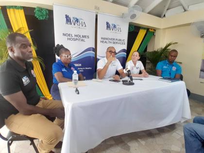 Dr Patrice Monthrope (left), senior medical officer at the Noel Holmes Hospital in Lucea, Hanover;  Princess Wedderburn (second left), CEO at the hospital; Minister of Health and Wellness Dr Christopher Tufton (centre); Devita McClaren, regional director a