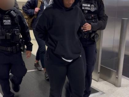Elaine Escoe in the custody of United States authorities. 