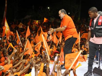 In this August 2025 photo Mark Golding is seen at a rally with PNP supporters.