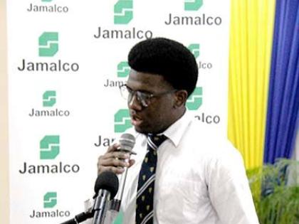 Scholarship recipient Marvin Whyte delivers a testimonial during Jamalco’s Education Assistance Awards Ceremony at the Wembley Centre of Excellence in Hayes, Clarendon, on Wednesday.