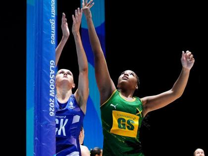 Azara Wilmot of Jamaica (right) and Cerys Finn of Scotland in action during the Netball Preliminary Round Pool B match at the Commonwealth Games in Glasgow, Scotland on Wednesday. 