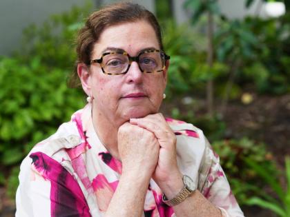 Miriam Singer, CEO of Jewish Community Services of South Florida, pauses as she speaks of the home health workers she had to let go after their TPS expired last week in Miami Beach, Florida.