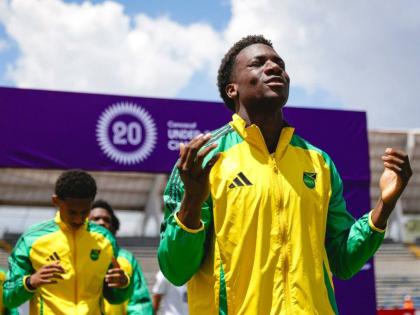 
Jamaica’s U20 players enter the field ahead of their Concacaf U20 Championship football game against Canada yesterday.