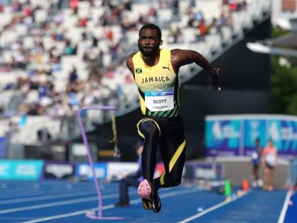 Jamaica’s Jordan Scott competes in the men’s triple jump final at the Commonwealth Games in Glasgow, Scotland, on Saturday, August 1.