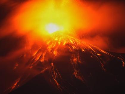 Lava flows out of the crater of the Fuego volcano, as seen from San Juan Alotenango, Guatemala,  onTuesday. 