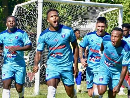 Salcedo players celebrate a goal.