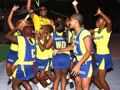 José Martí  High School celebrate their win over Gaynstead High School in the Insport Summer Challenge Cup Netball final at the Leila Robinson Netball Courts, National Stadium on Tuesday.