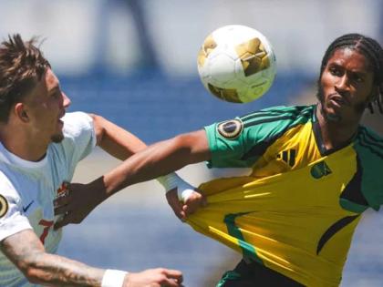 Canada under-20s Marsel Bibishkov (left) and Jamaica’s Jaquan Brown tussle for the ball during a Concacaf  Under-20 Championship game at the Estadio Universitario BUAP in Puebla, Mexico on August 1. 