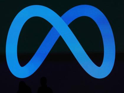 FILE - A Meta logo is shown on a video screen at LlamaCon 2025, an AI developer conference, in Menlo Park, Calif., April 29, 2025. (AP Photo/Jeff Chiu, File)
