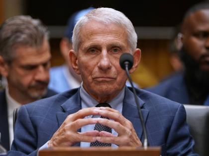 Dr Anthony Fauci appears before the Senate Homeland Security and Governmental Affairs Committee at the Capitol, July 29, in Washington. 