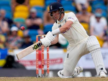England’s Dan Lawrence bats against West Indies during day five of their second cricket Test match at the Kensington Oval in Bridgetown, Barbados, March 20, 2022.
