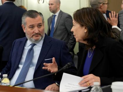 AP 
Senate Commerce, Science, and Transportation Committee Chair Senator Ted Cruz (left) talks with ranking member Senator Maria Cantwell before the start of a hearing on Capitol Hill in Washington, Wednesday, January 15, 2025. 