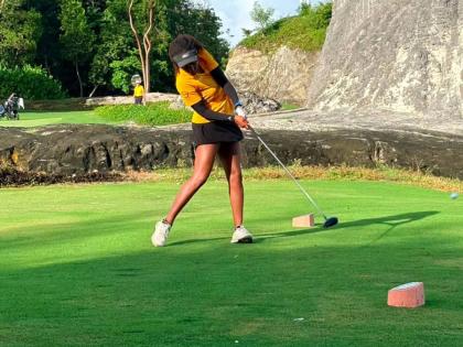 Courtesy of @jamaicagolfassociation/IG 
Kierra Williams gets ready to swing during the Caribbean Amateur Golf Championships at the Royal Blue Golf Course in Nassau, Bahamas.
