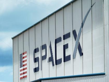 The SpaceX logo is displayed on a building in May 2020 at the Kennedy Space Center in Cape Canaveral, Florida.  