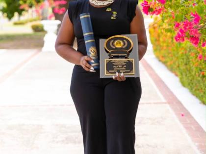 The 2026 Governor-General’s Achievement Award (GGAA) recipient, Kaydia Clair, proudly displays her plaque following the awards ceremony, held at King’s House in St Andrew last month.