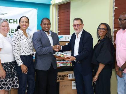 Representatives from the American Friends of Jamaica (AFJ), the Ministry of Agriculture, Fisheries and Mining, and RADA gathered following the symbolic handover of 247,517 packets of organic seeds (valued at US$750,000) at Bodles Research Station to suppor