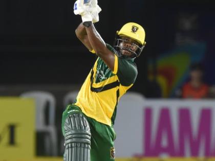 Jamaica Kingsmen batsman Kirk McKenzie lifts a delivery back over the bowler's head on his way to 69 during the Republic Bank Caribbean Premier League T20 game against the Trinbago Knight Riders at Sabina Park tonight.