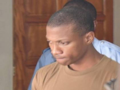 Policeman Joshua Hamlet, who is charged with murder, leaving a magistrate court in Roseau, Dominica on August 17, 2026.  